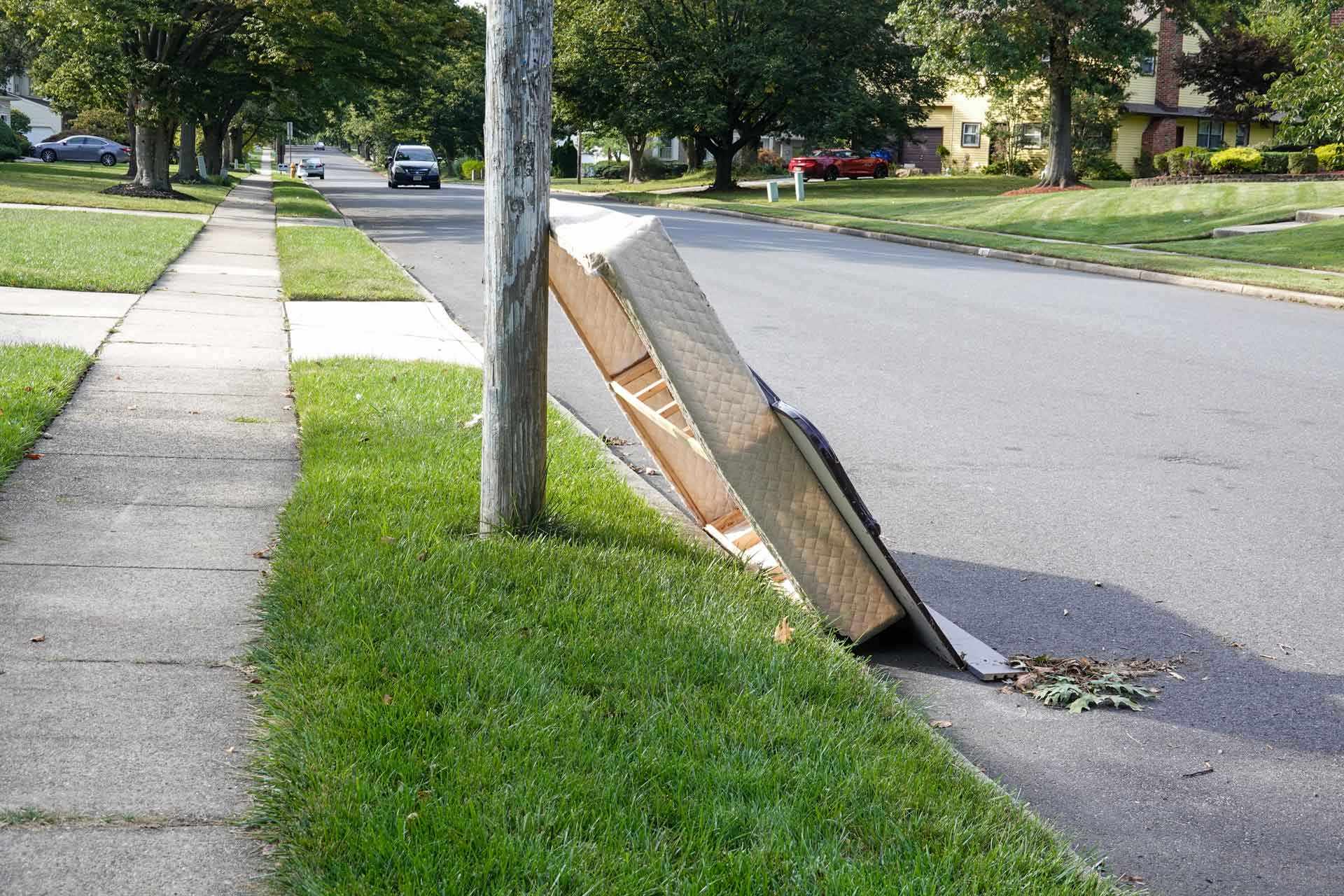 Old box spring by road